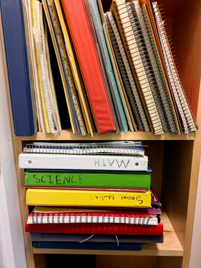 Shelves of reclaimed school supplies await the next school year, photo by Eve Fox.